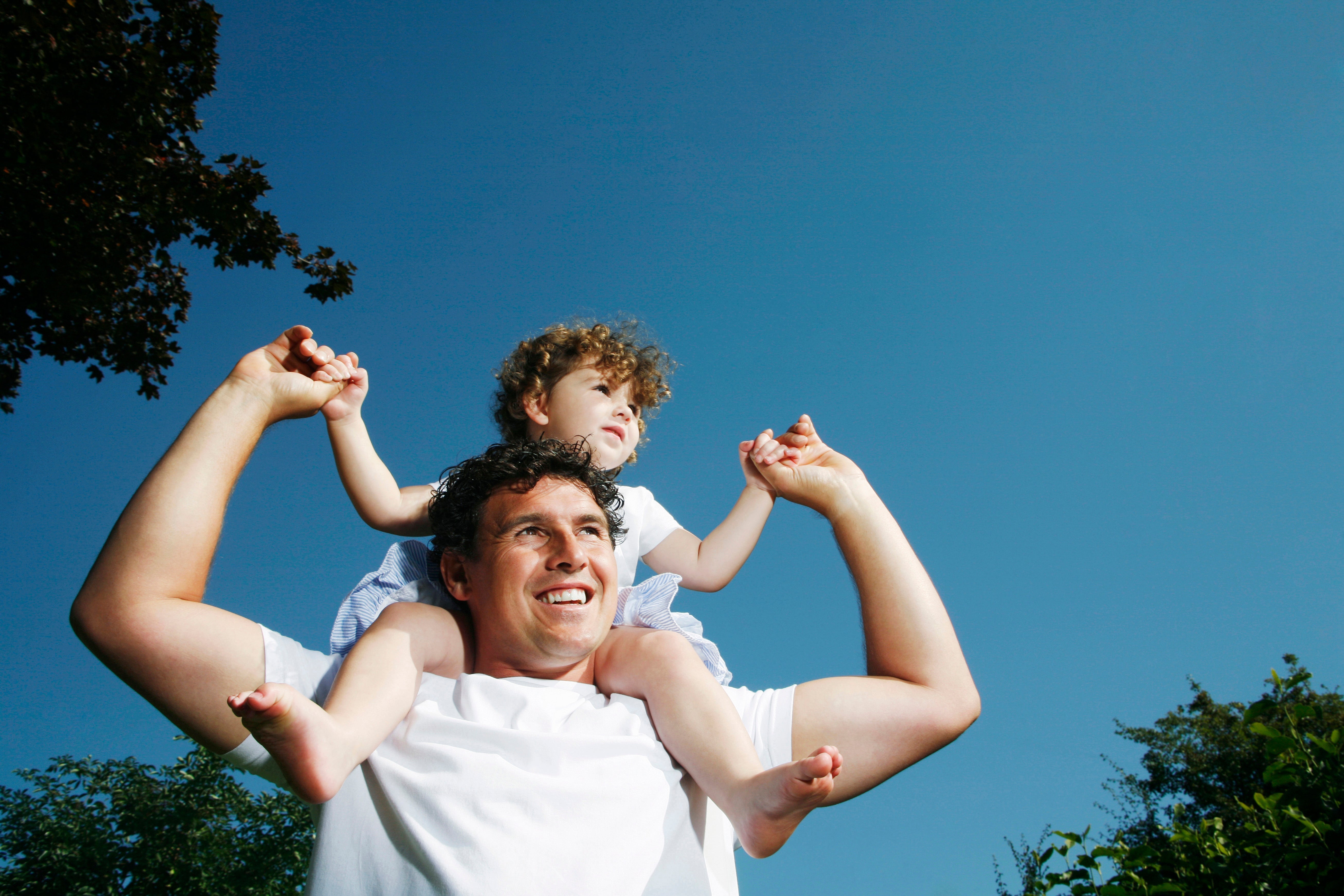Father with boy on his shoulders